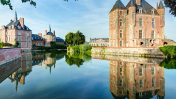 Castle on the lake in the Loire Valley in France photo via Depositphotos