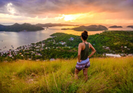 Girl looking over Coron Town and Bay from Mount Tapyas photo via Depositphotos