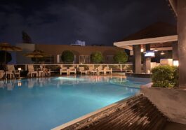 Quest Hotel's pool and bar