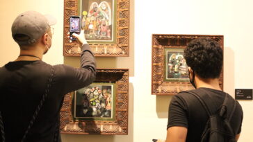 Museum guests enjoy the featured artworks at the Yuchengco Museum