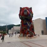 The flower covered puppy giant outside the Guggenheim Museum
