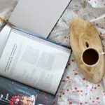 Travel themed cookbooks by Micheile Henerson via Unsplash