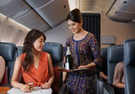 Singapore Airlines Premium Economy Serving Champagne