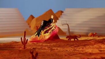 The PUMA SCOOT ZEROS x CHEETOS® basketball shoe features a synthetic, mesh, and textile upper, PROFOAM EVA midsole for instant cushioning, Formstrip lockdown support, and full-coverage rubber outsole with an anti-slip traction pattern, complete with the Scoot logo and PUMA x CHEETOS® design details.