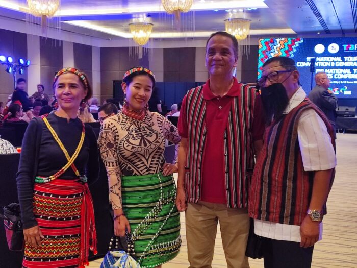 Tour guides from the Cordillera region sporting their regional attires