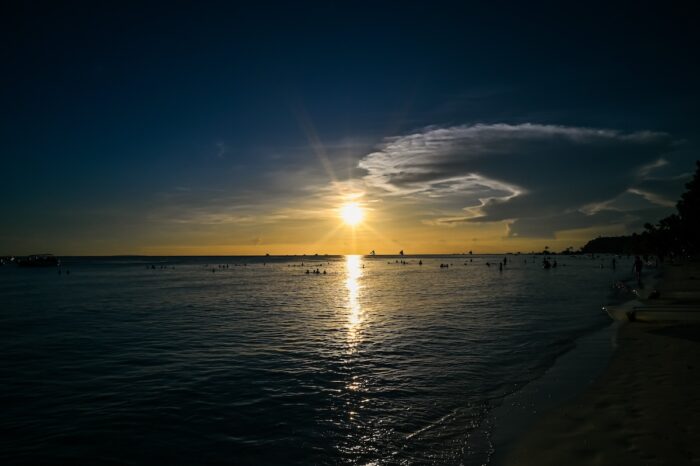 Experience the postcard-perfect Boracay sunset while indulging in the island’s upscale offerings