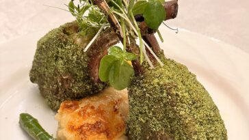 Roast Rack of Lamb in Herb Crust, Rosemary Garlic Jus, Potato Gratin, Market Vegetables