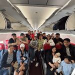 A man proposes to his girlfriend during their AirAsia flight to Bohol.