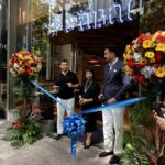 Michael Needham, Thai Ambassador Makawadee Sumitmor, Alex Offeand getting ready to cut the ribbon