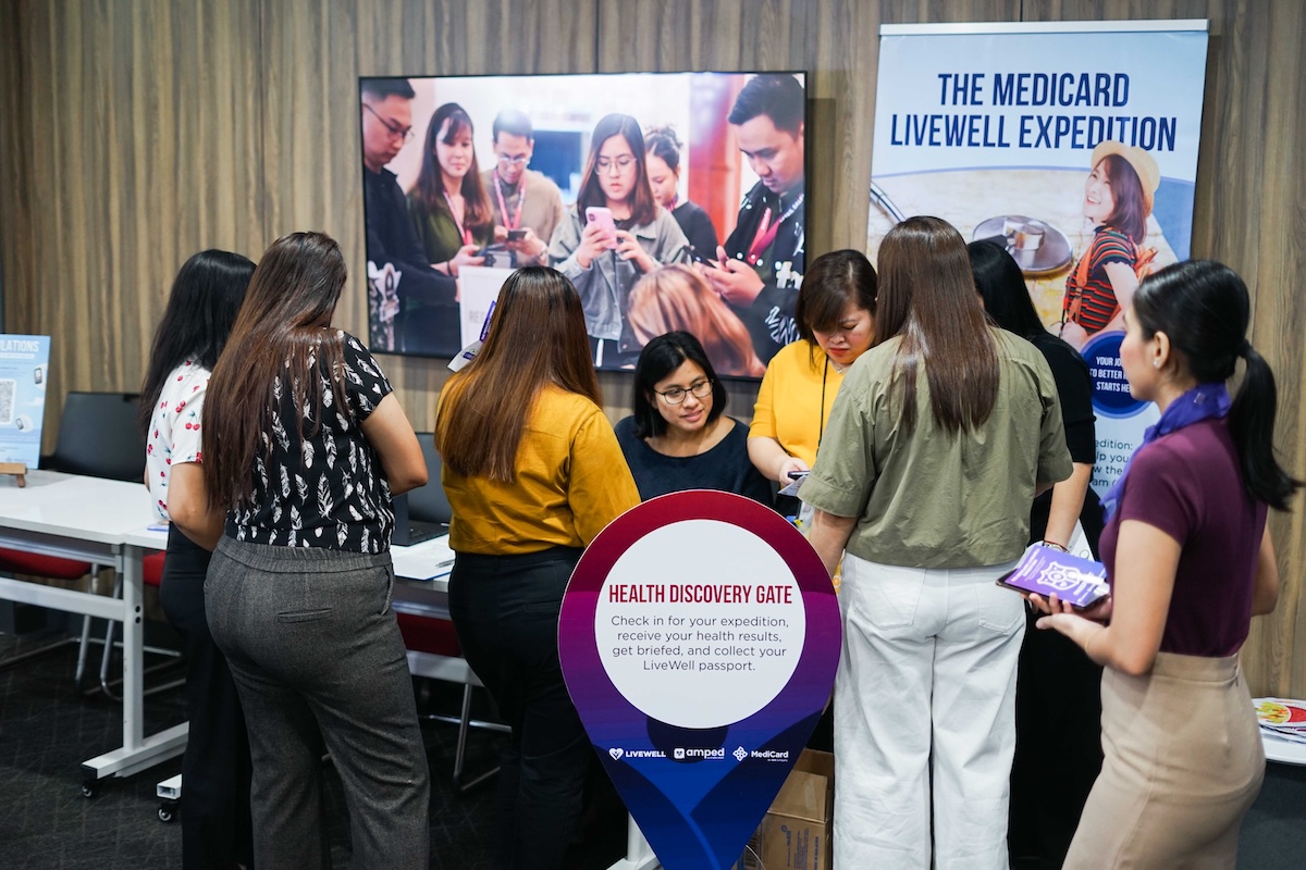 Livewell participants having their passports stamped in one of the stops for the Livewell Expedition. 