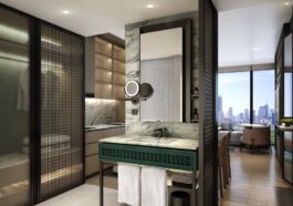 A guest room at Fraser Suites Reserve Bangkok, with views across the Bangkok skyline.