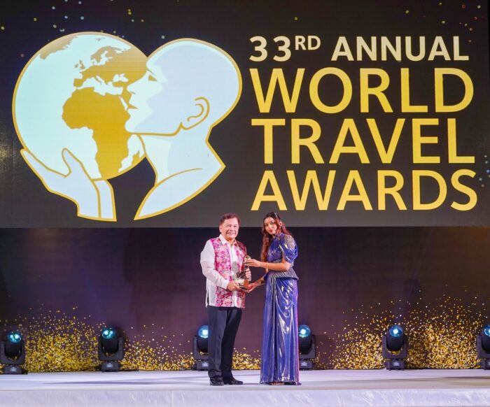 Atty. Jose D. Lina, Jr., President of The Manila Hotel, receives The Philippines' Leading Hotel 2026 award presented by World Travel Awards