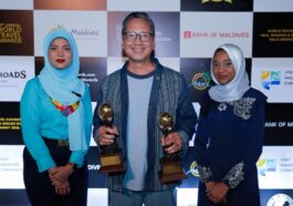 General Manager Den Navarro proudly holds Savoy Hotel Manila’s two World Travel Awards alongside the presenters at the 33rd World Travel Awards Gala Ceremony in Crossroads Maldives