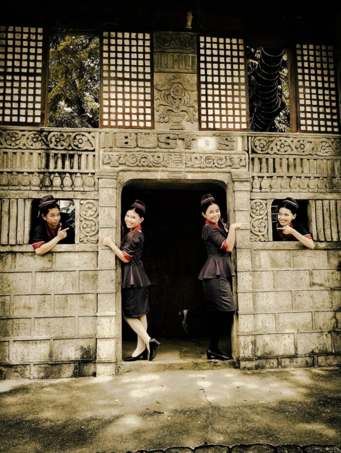 A group of tourism students from Bulacan State University - Main Campus captures a playful moment while embracing the cultural heritage of Bustos, Bulacan.