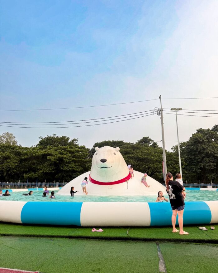 Bright inflatable obstacles transform the pool into a playful adventure, where visitors can splash, climb, balance, and enjoy the water at their own pace.