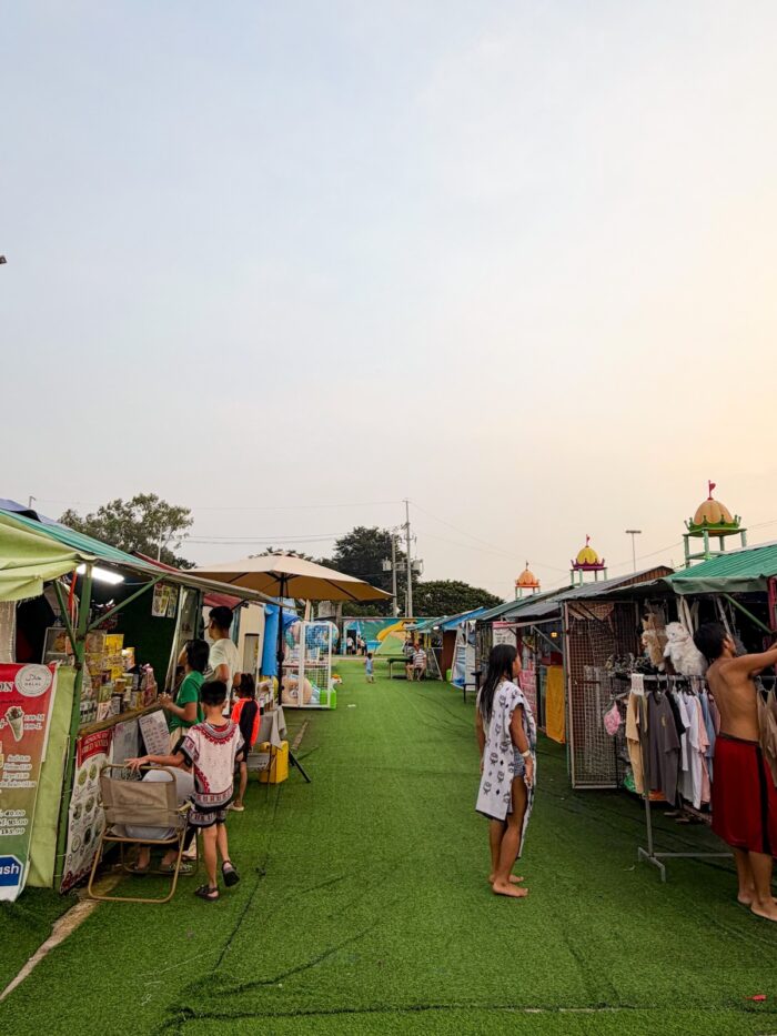 Food stalls and small shops offer visitors convenient places to grab food and essentials.