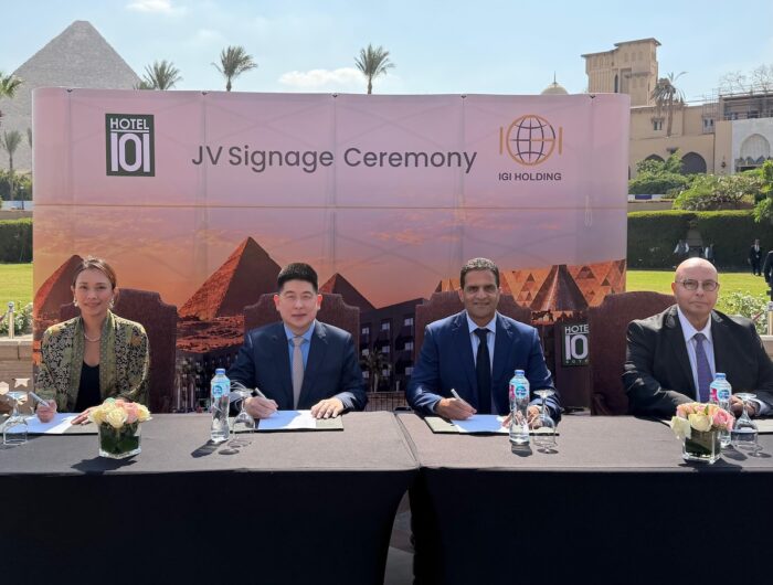 Hotel101 Founder Mr Injap Sia and Mr Khaled Sheta of IGI Holdings leads the Signing Ceremony with the world famous EGYPT PYRAMIDS at the background