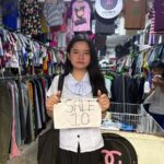 Inside a local second-hand clothing store, budget shoppers can discover a variety of pre-loved apparel at prices starting at 10 pesos.