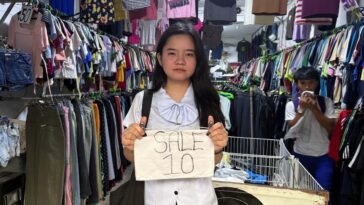 Inside a local second-hand clothing store, budget shoppers can discover a variety of pre-loved apparel at prices starting at 10 pesos.