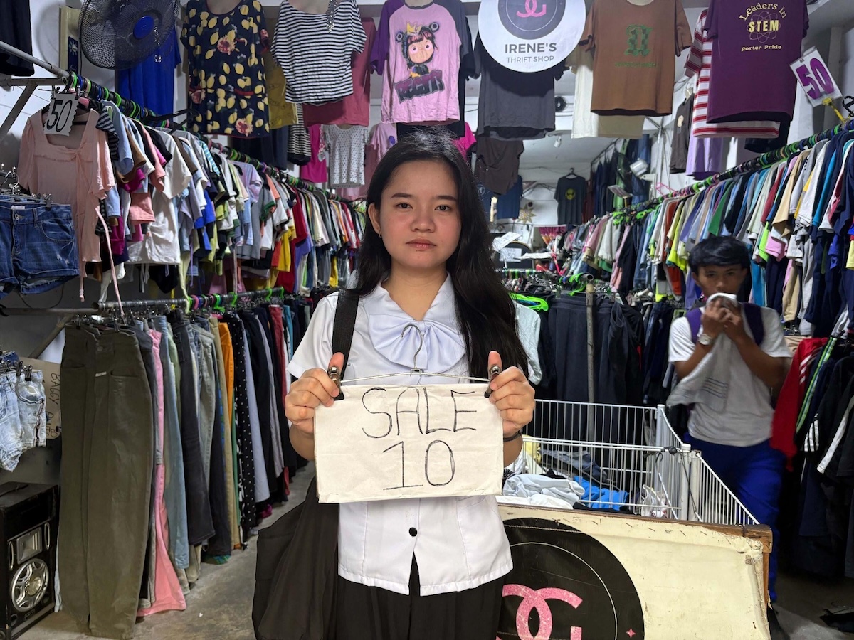 Inside a local second-hand clothing store, budget shoppers can discover a variety of pre-loved apparel at prices starting at 10 pesos.