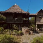 “Silid ng Buhay.” — Filipino nipa houses on stilts, an example of traditional Filipino architecture, in the cultural attraction