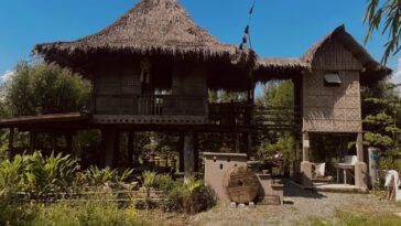 “Silid ng Buhay.” — Filipino nipa houses on stilts, an example of traditional Filipino architecture, in the cultural attraction