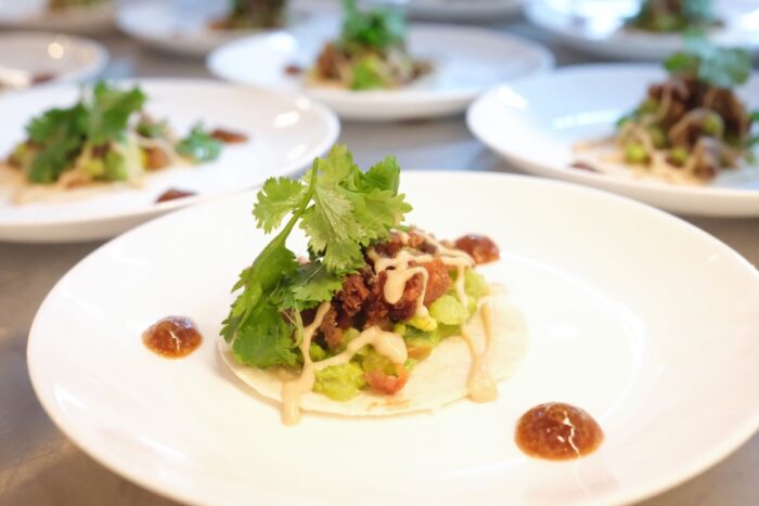 Sisig, Reimagined: Soft Taco with Pork SisigSol Victoria's signature sisig as a soft taco, topped with crunchy pork, avocado, salsa, and calamansi. 
