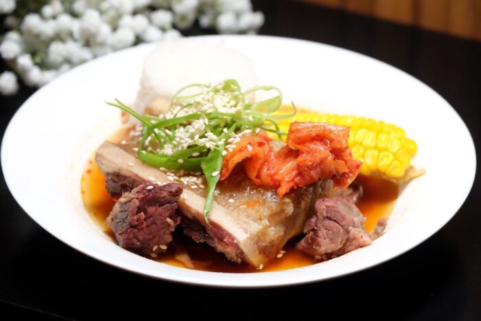 Fire Meets Tradition Kimchi BulaloThe Grand Prize winner at the 2024 Creative Bulalo Challenge, with homemade kimchi, beef, and rich broth. 
