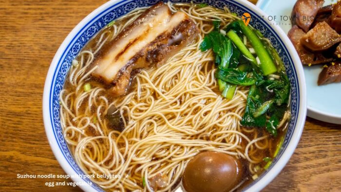 Suzhou noodle soup with pork belly, tea egg and vegetable